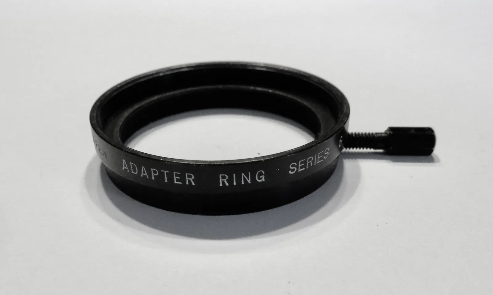 Vintage Black Metal Filter Adapter - Series 6 - Clamp-On - In Good Condition
