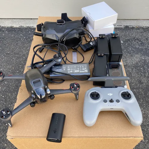 thumbnail-0 for DJI FPV Drone Fly More Combo Package